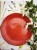 Ceramiczny talerzyk spodek 16 cm w kolorze malinowym handmade, widok pod kątem